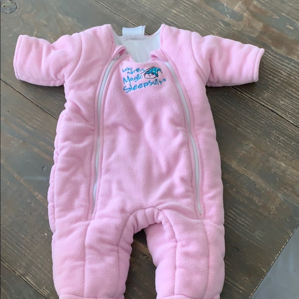 Pink baby Merlin magic sleepsuit